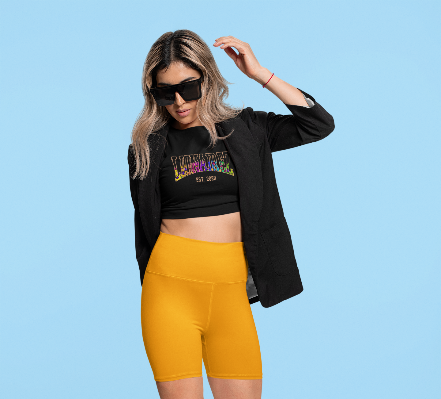 crop-top-and-bike-shorts-mockup-of-a-trendy-woman-wearing-an-athleisure-outfit-42344a.png