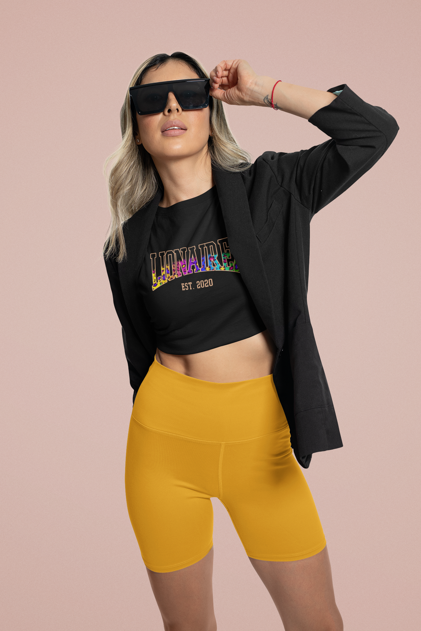 crop-top-mockup-of-a-stylish-woman-wearing-bike-shorts-at-a-studio-42343.png